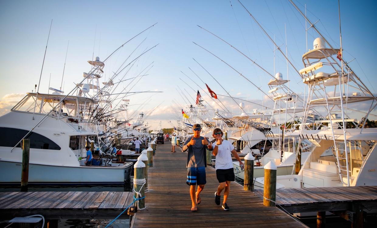 Two men walking along the marina at Sandestin Golf and Beach Resort