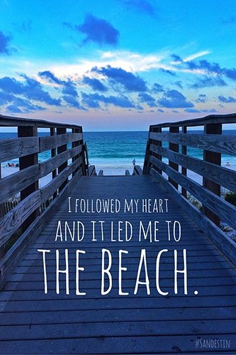 Boardwalk leading to the ocean and "I followed my heart and it led me to the beach"