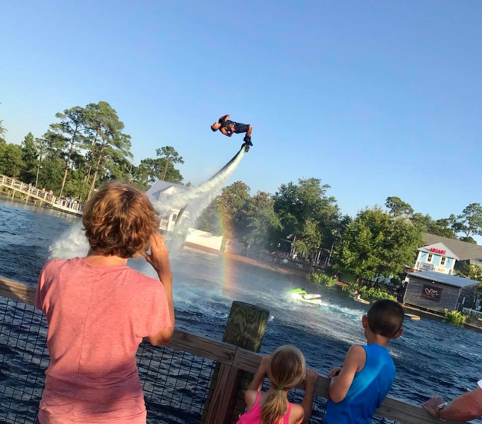 Man soars over lagoon on hydro jet board