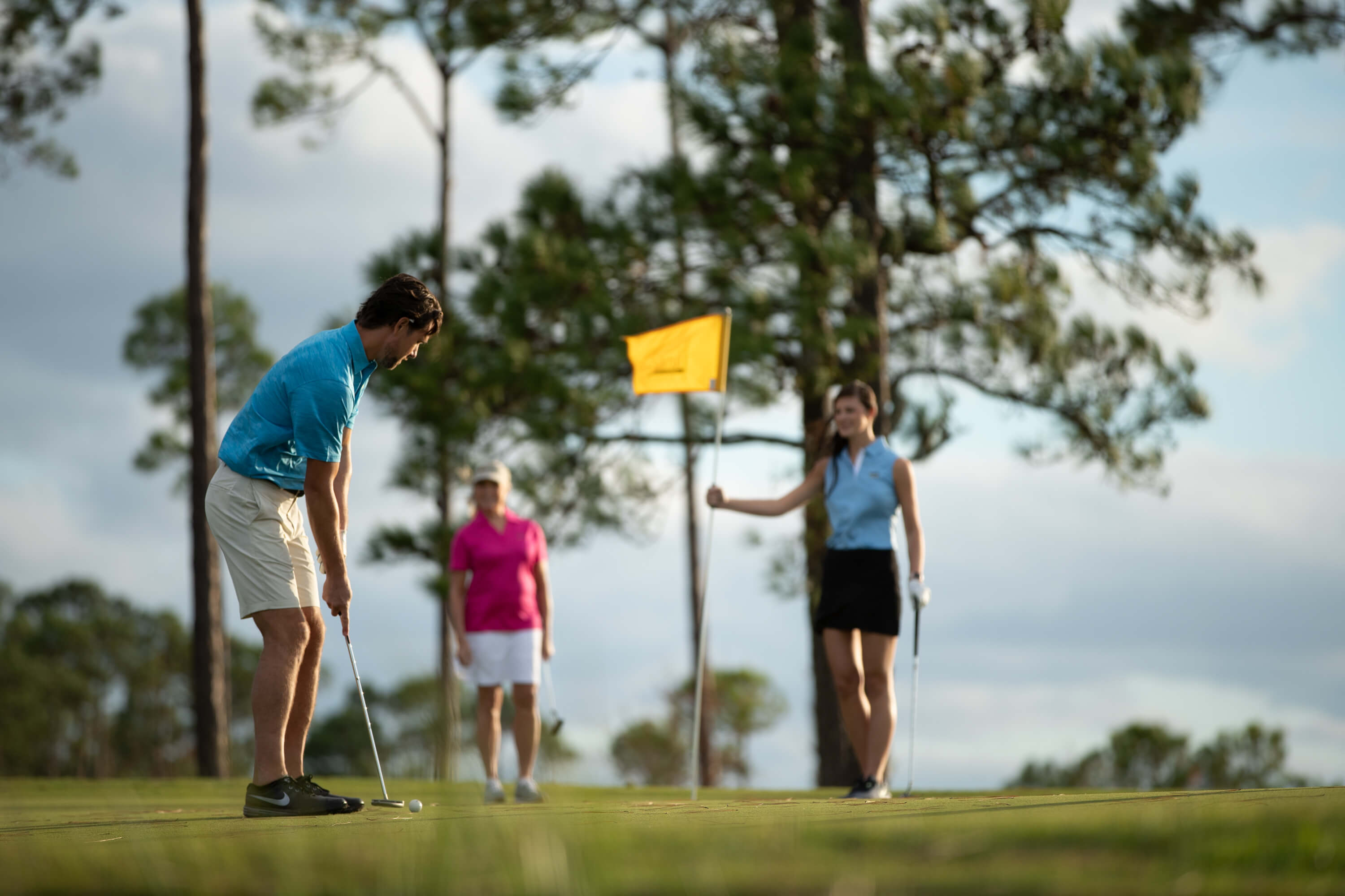 Group playing golf