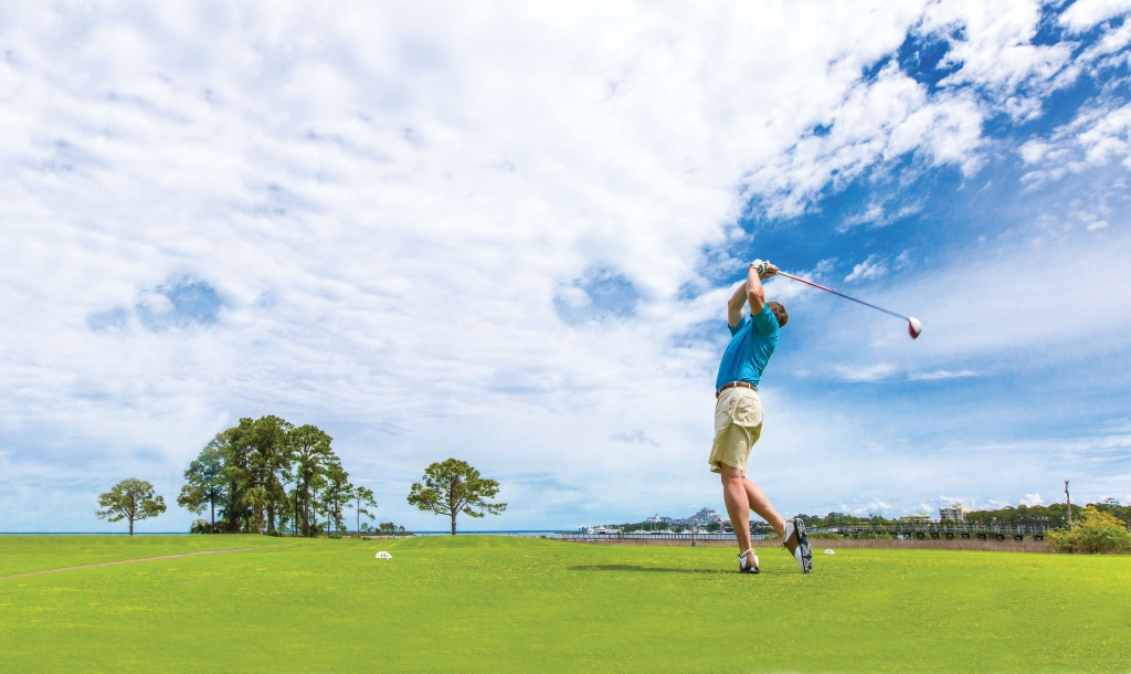 Man playing golf