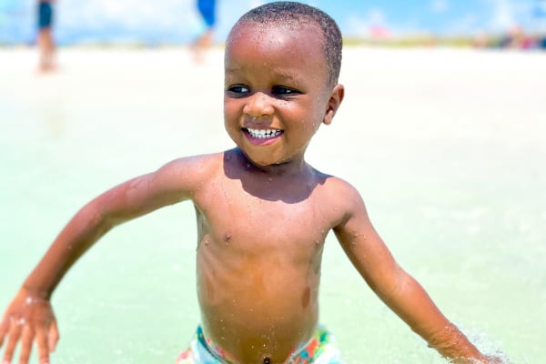 Child splashing at beach