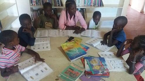 A woman reading to children