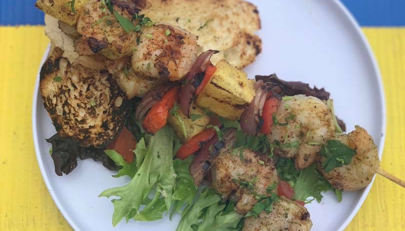 shrimp plated on a patio table at Marina Bar & Grill