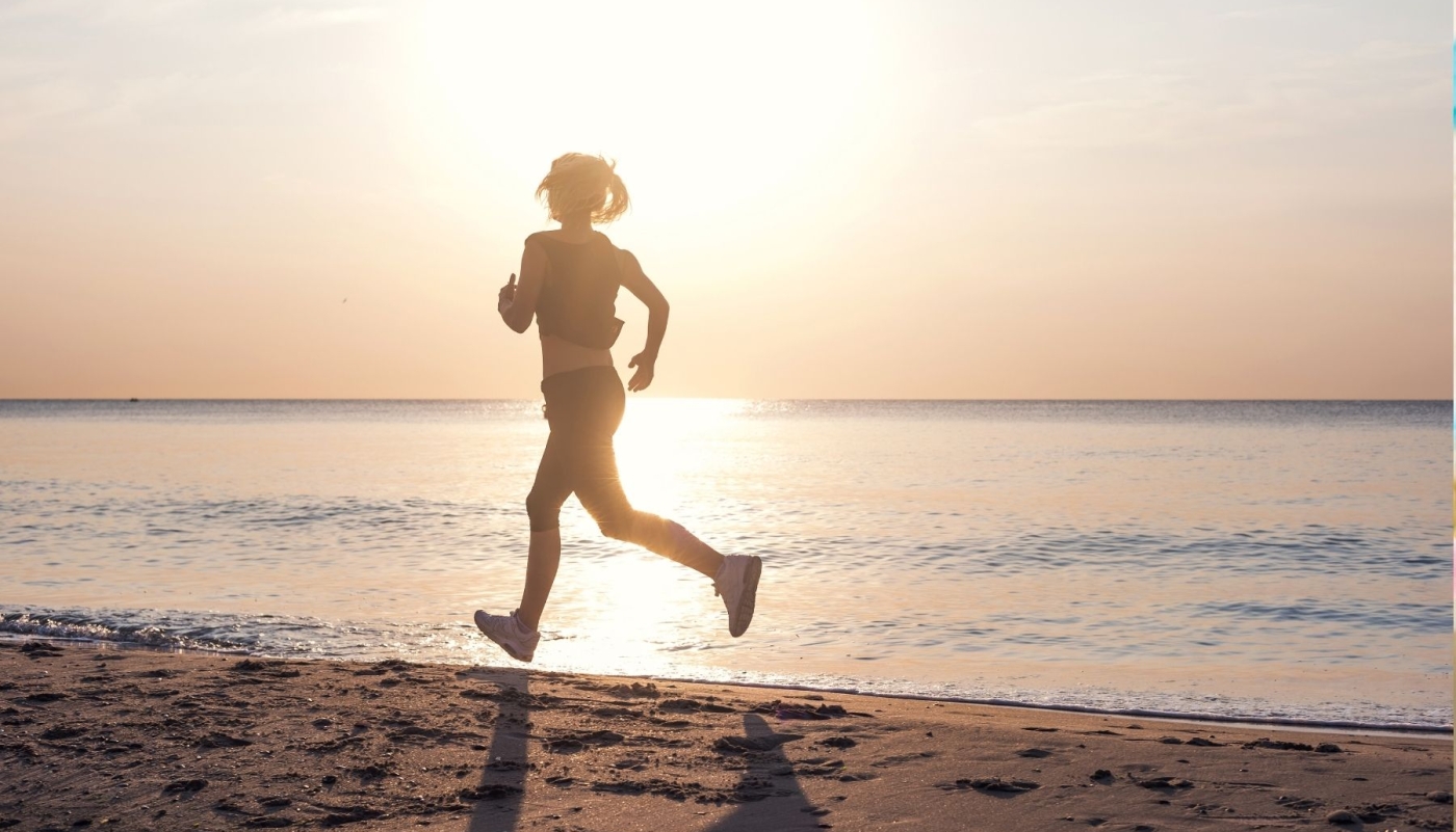 Woman running on beach