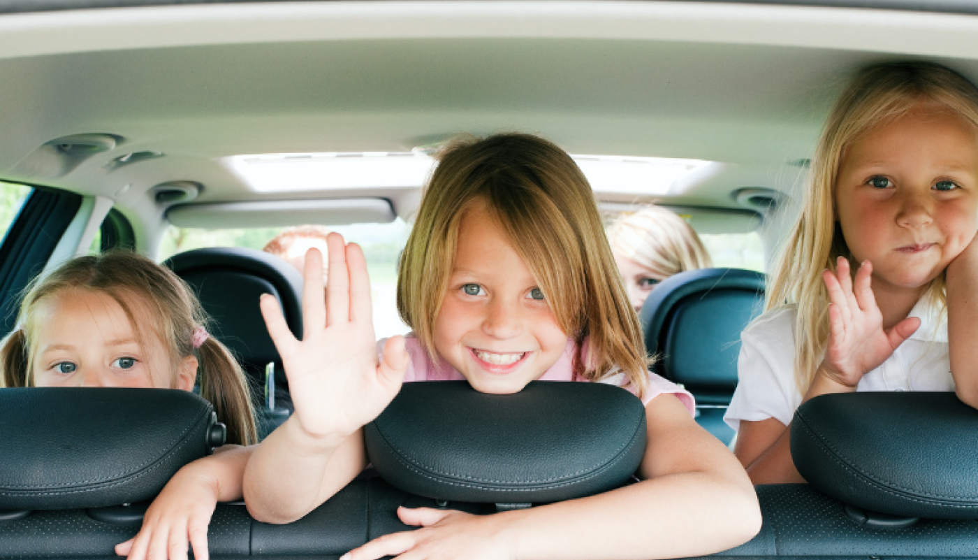 Kids getting ready for a road trip