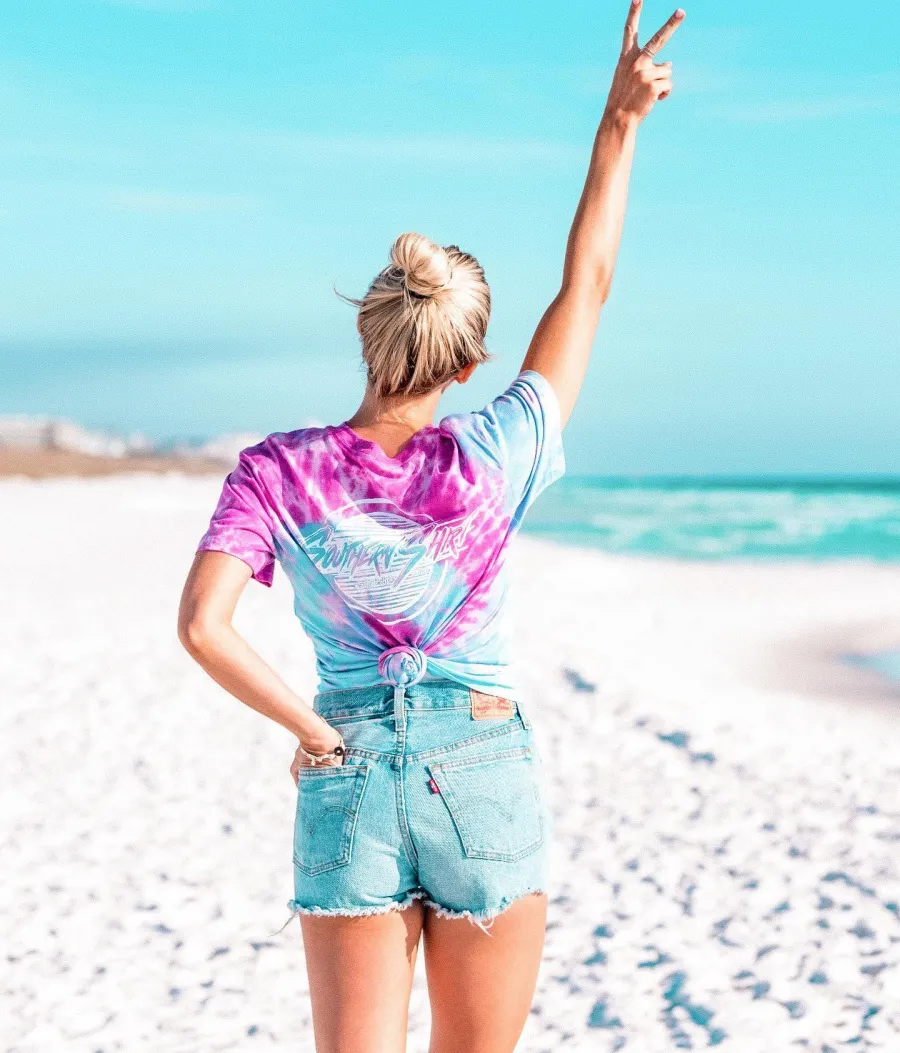 Woman in tie-dye shirt