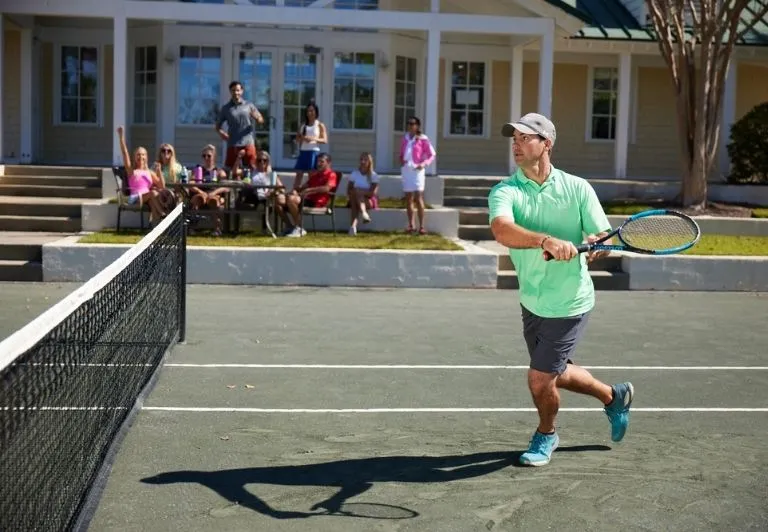 Tennis match with people cheering