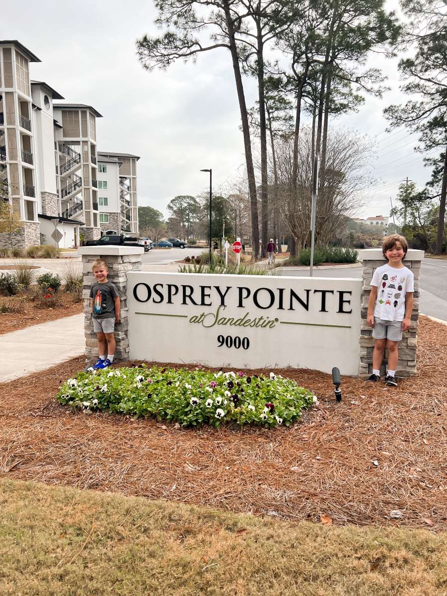 Kids in front of sign