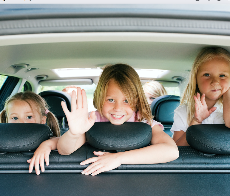 Kids getting ready for a road trip 