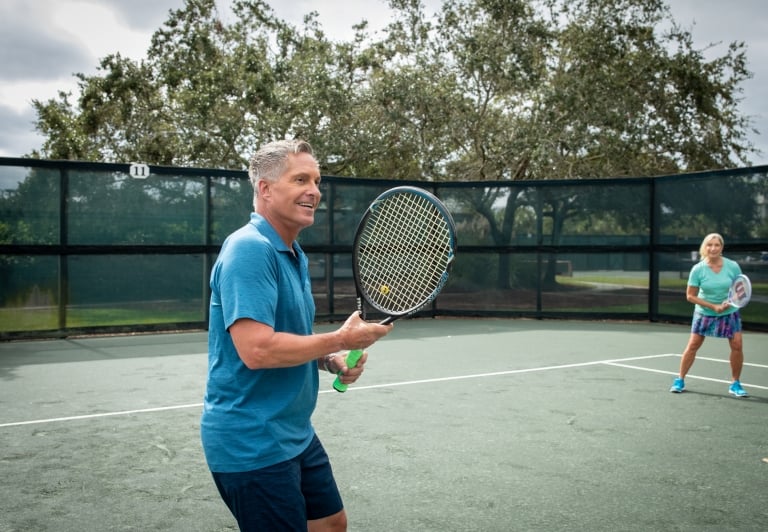 Man playing tennis