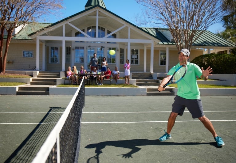 Tennis court with group