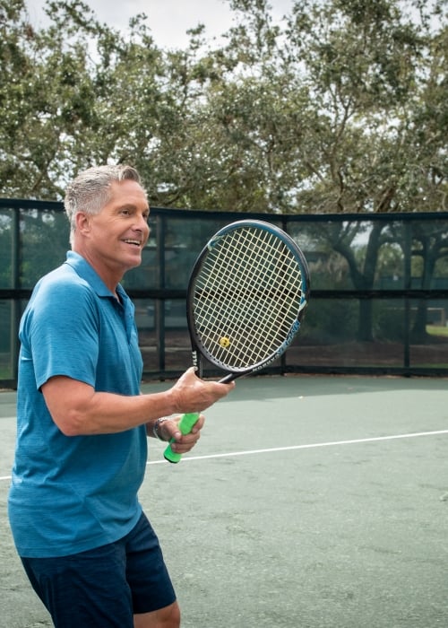 Man playing tennis