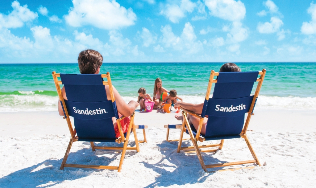 Family relaxing on the beach