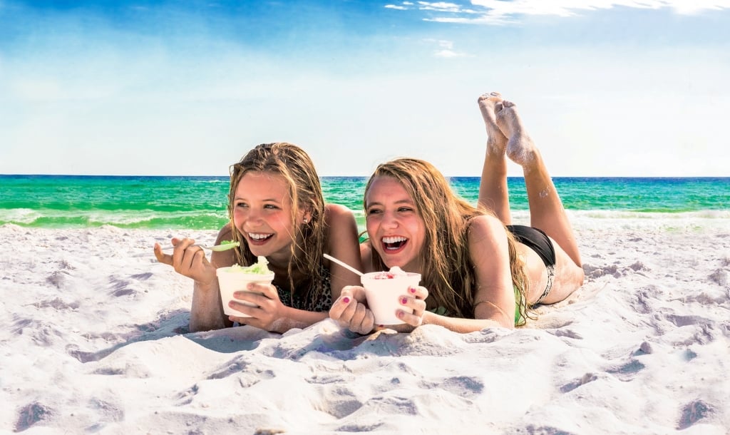 Happy Young Teenage Girl Swimsuit Stands Barefoot Splashing Water