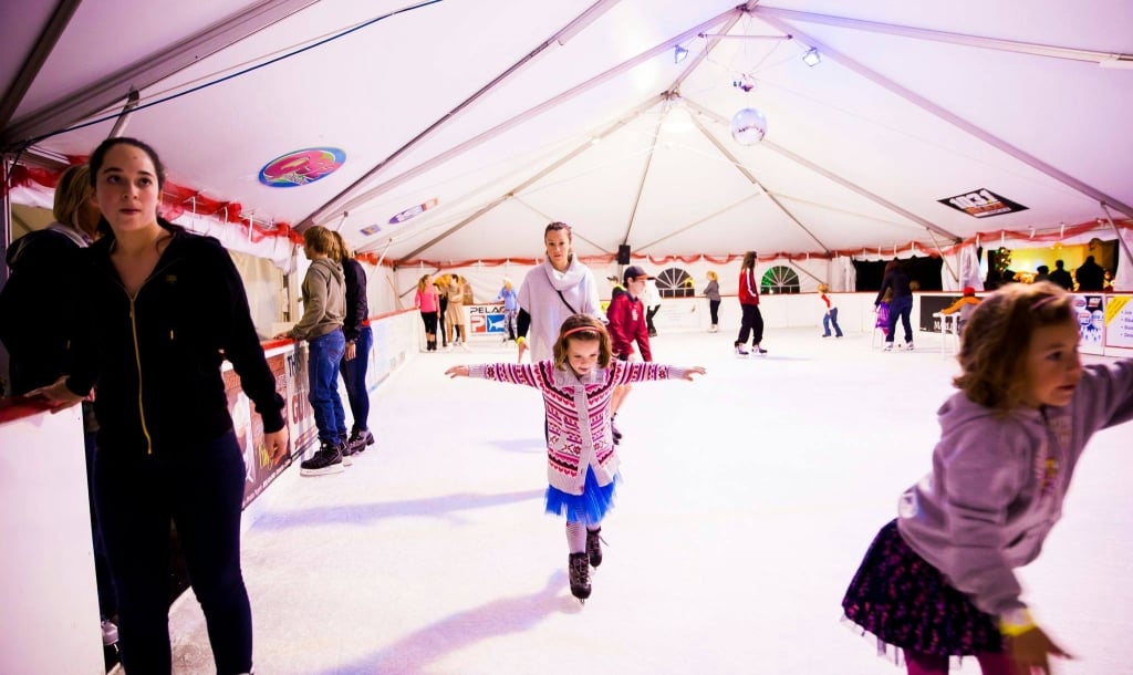 A family Ice Skating at Sandestin Golf and Beach Resort