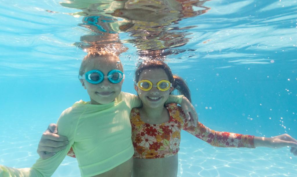 Kids swimming in the Beach Club pool