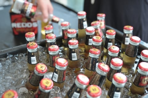 a cooler filled with cold refreshing beer