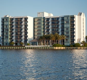 Bayside at Sandestin building with water in the foreground