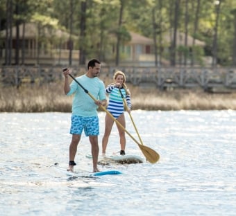 couple paddle boarding