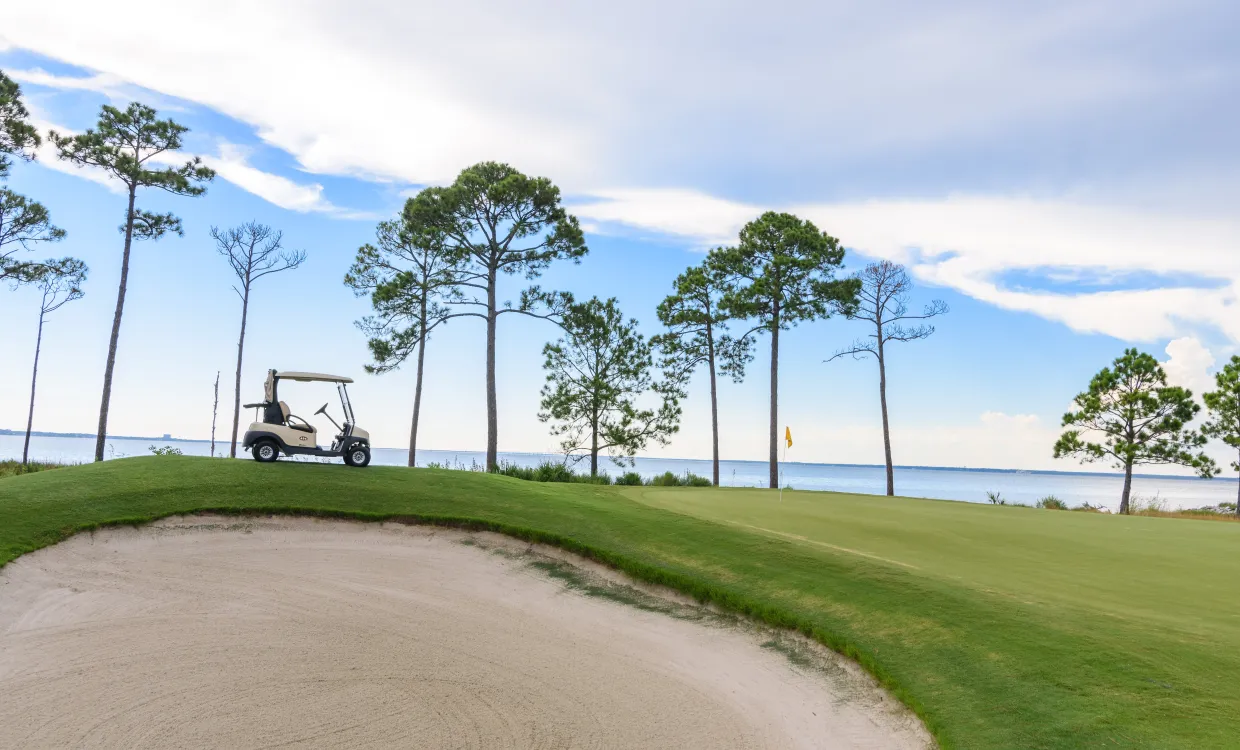 sand trap and golf cart at sandestin golf and beach resort golf course