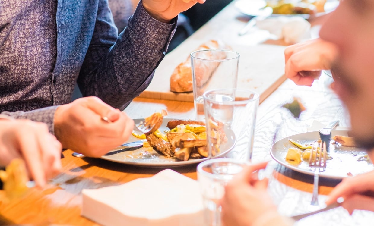 group of colleagues eating lunch together