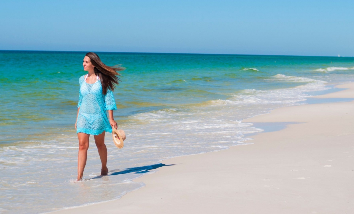 Woman walking on the beach